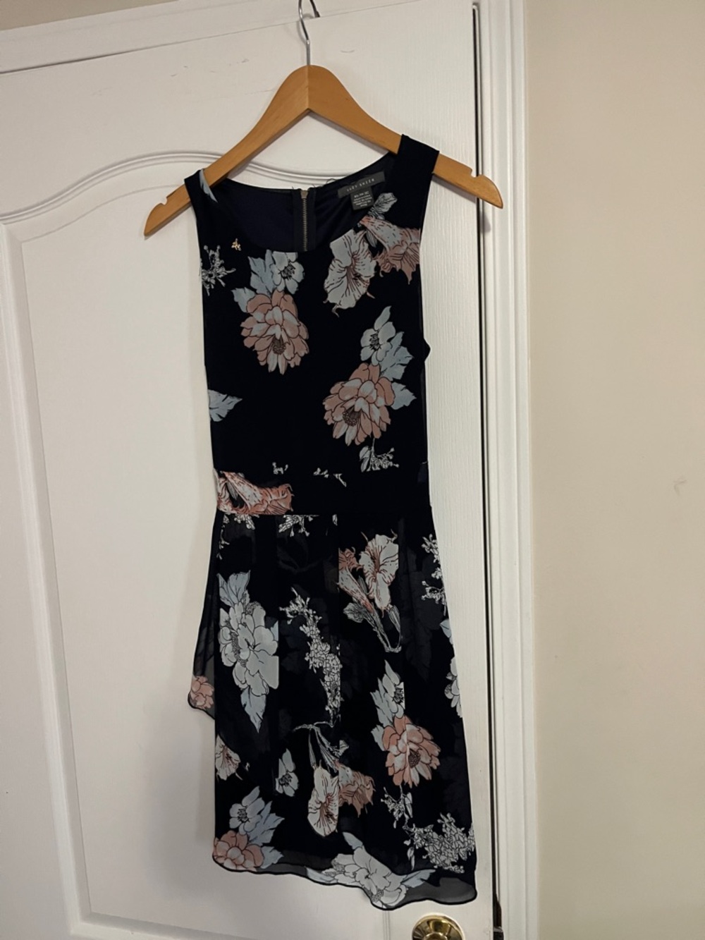 Suzy Shier Black Floral Sleeveless Mini Dress that ties back.